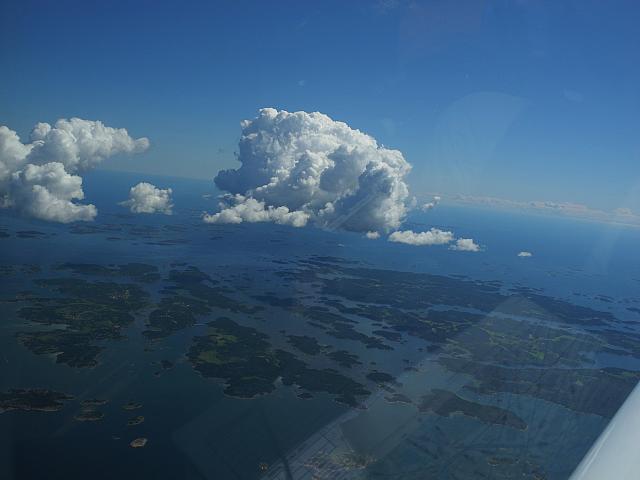 on the Finnish coast waiting a boar clouds